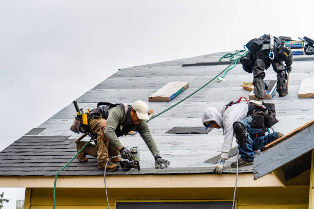 Professional Gutter Installation technician working in Bogota, NJ